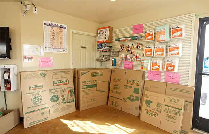 Packing supplies for sale including boxes, tape, mattress covers, and more.
