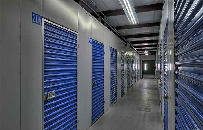 Indoor climate controlled storage unit hallway.