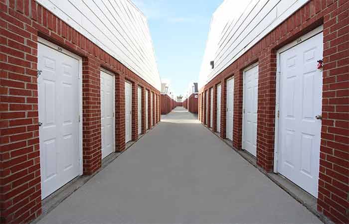 Breezeway storage units with easy access and swing-doors.