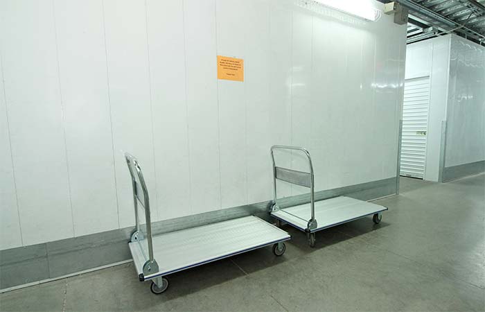 Push carts for ease of loading and unloading storage items.
