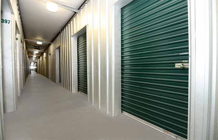 Small indoor climate controlled units with roll-up doors.
