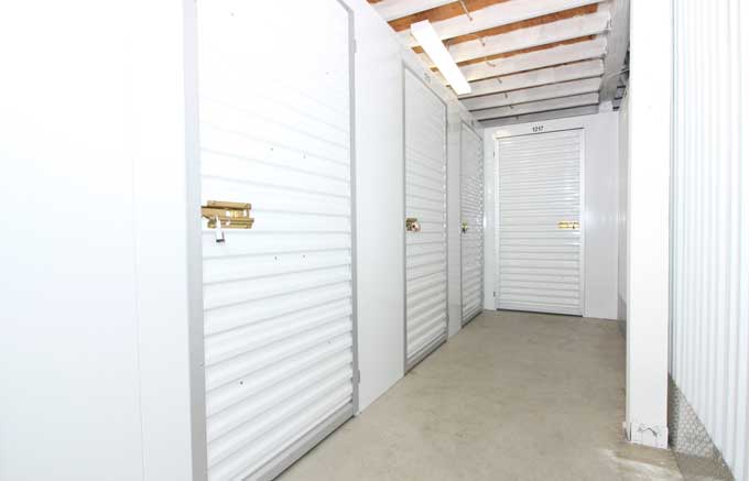 Indoor Storage units with swing doors.
