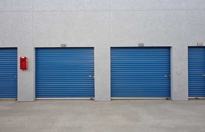 Row of large drive-up storage units.