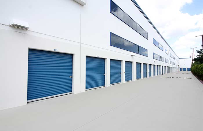 Drive-up storage units with wide hallways and ease of access.