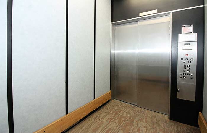 Deep service elevator for ease of moving storage items.