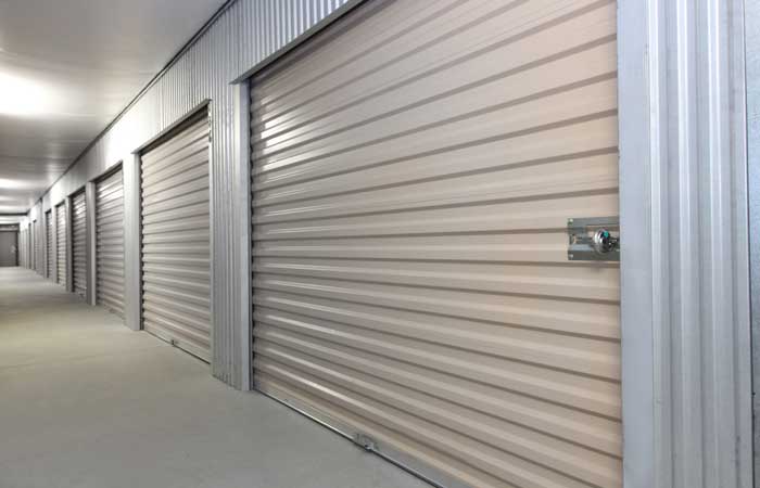 Large indoor storage units with easy access and roll-up doors.