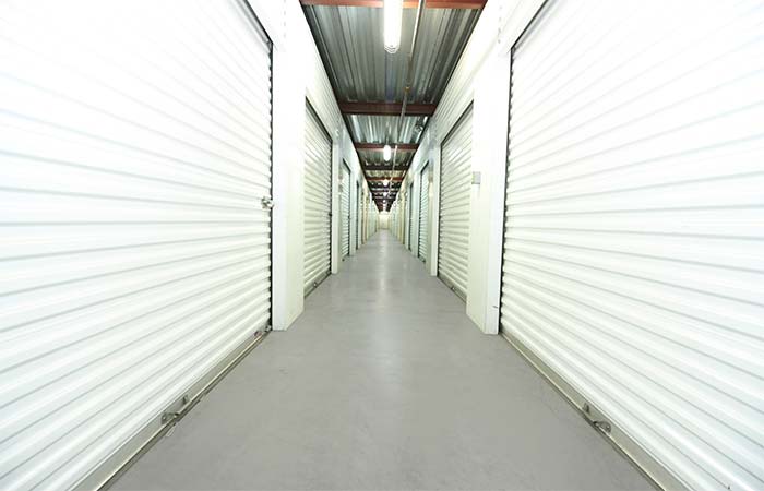 Large indoor storage units with easy access and roll-up doors.
