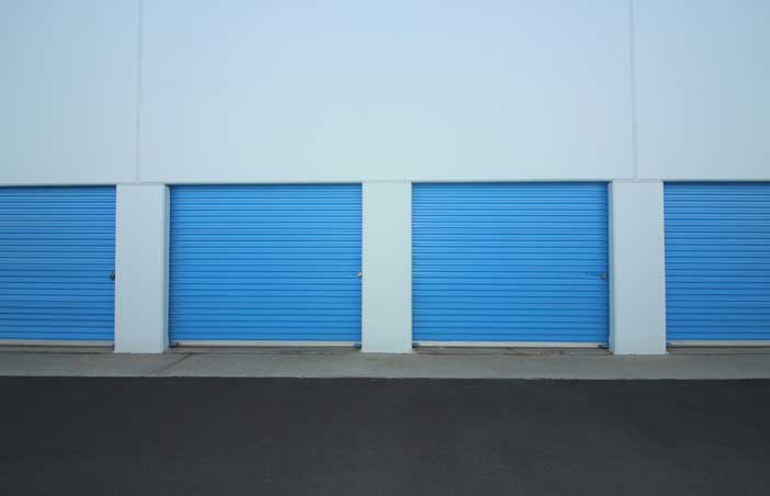 Row of large drive-up storage units.