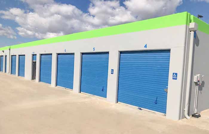 Accessible drive-up storage units with roll-up doors.