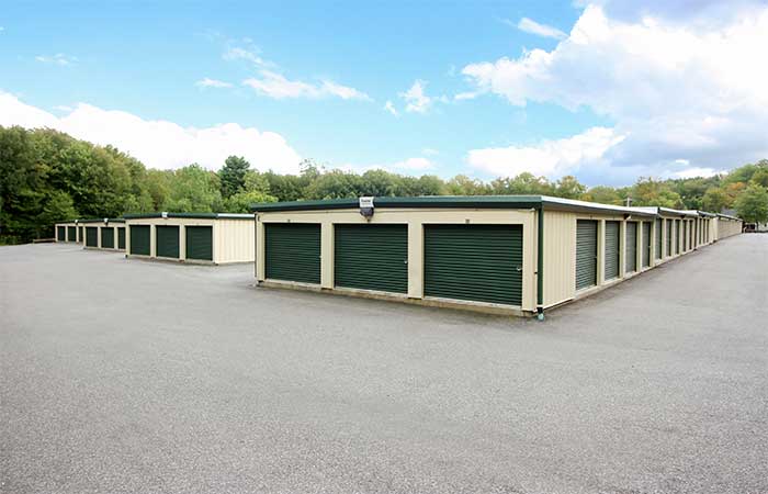 Drive-up storage facility with a variety of sized units.