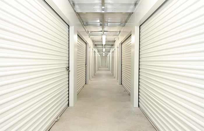 Large indoor storage units with easy access roll-up doors.