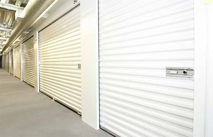 Indoor climate controlled storage units with roll-up doors.