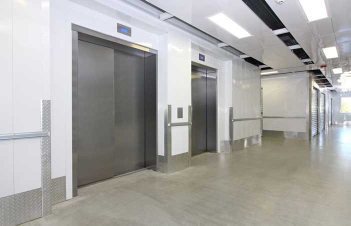 Indoor elevators for easy access to climate controlled storage units.