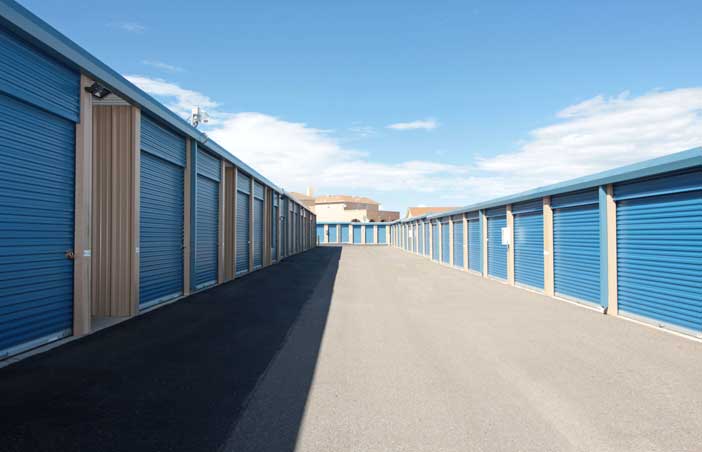 Wide drive-up aisle for easy access to storage units.