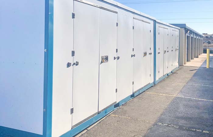 Rows of outdoor portable storage with wide swing doors