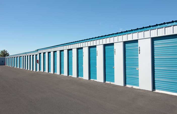 Row of small drive-up storage units.