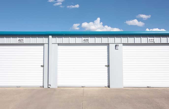 Large drive-up storage units with roll-up doors and easy access.