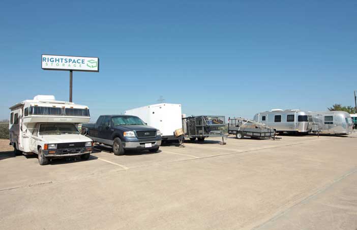 Paved RV, trailer, and auto parking spaces.
