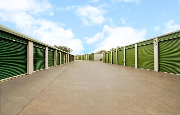 Drive-up storage units with roll-up doors.