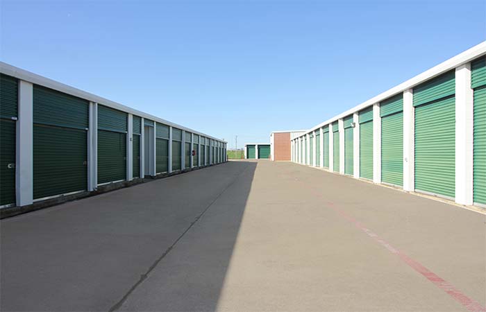 Wide aisle drive-up storage units with easy access.