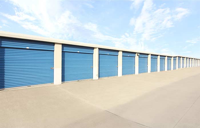 Large drive-up storage units with easy access and roll-up doors.