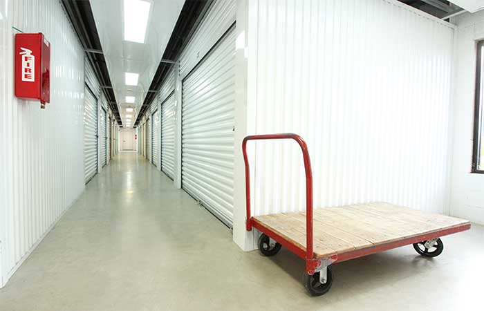 Indoor push cart for ease of loading and unloading storage items.