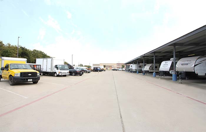 Covered RV storage and uncovered auto storage parking spaces.