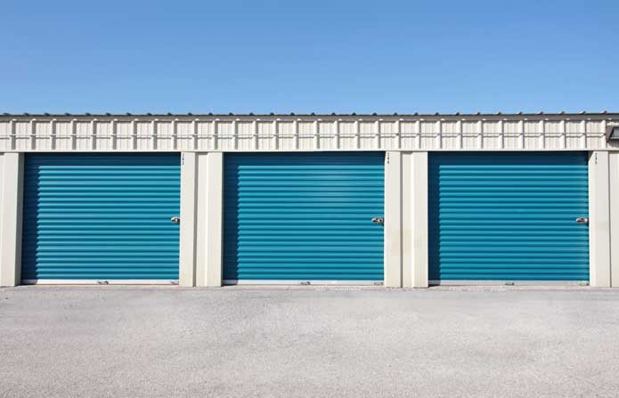 Row of large drive-up storage units with easy access.