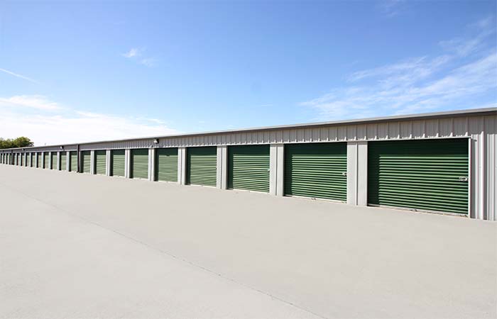 Large drive-up storage units with roll-up doors and easy access.