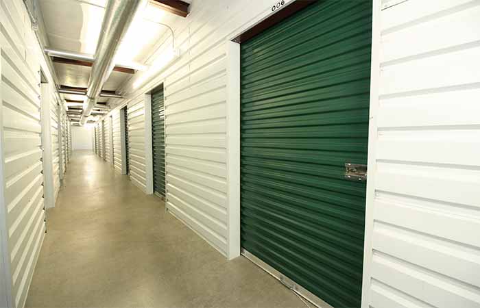 Indoor climate controlled storage units with roll-up doors.